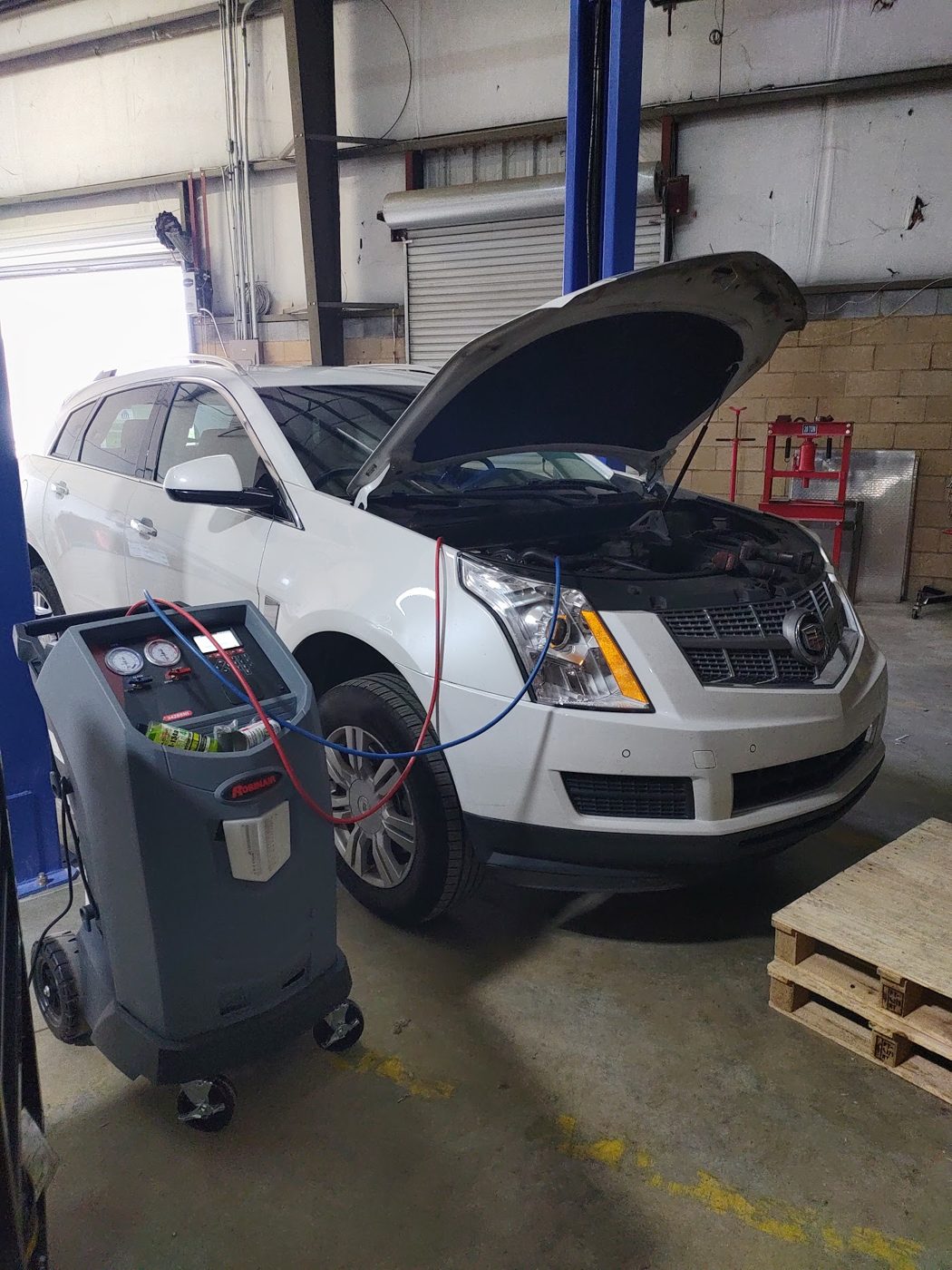 Car on the lift at Aldridge Automotive